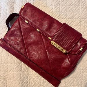 Juicy Couture dark red clutch leather purse